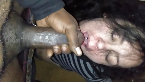 Horny black slut swallows a black cock in the deepthroat