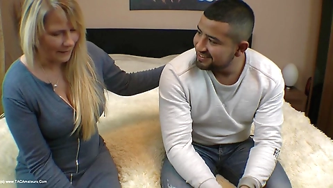 Busty mature milf fucked in the kitchen by her stepdaughter