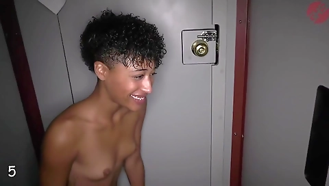 Big boobed black chick rides a black and blonde dildo