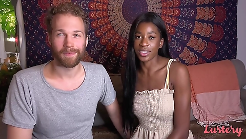 Busty brunette with a huge black cock gets fucked on camera