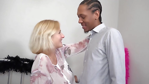 Hot black milf with a large booty is getting fucked by a dude