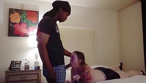 Amateur interracial blowjob with a tattooed hottie